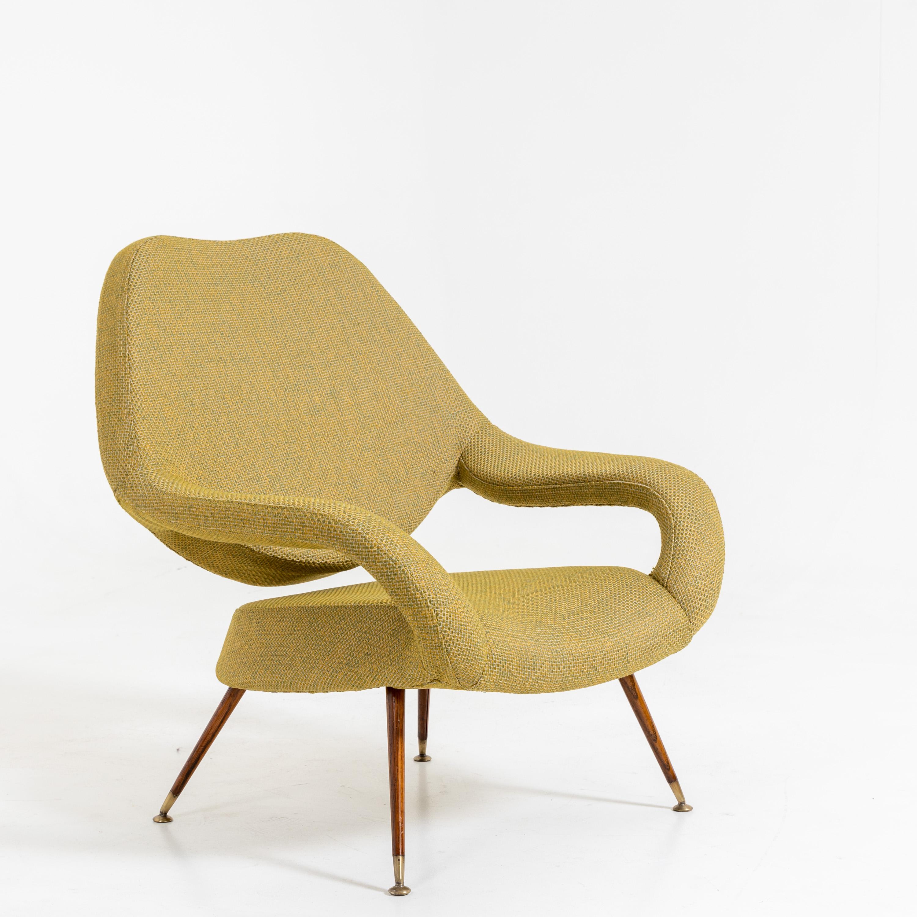 Lounge armchair on conical legs with brass sabots and green upholstery fabric, designed in 1954 by Gastone Rinaldi for Rima.