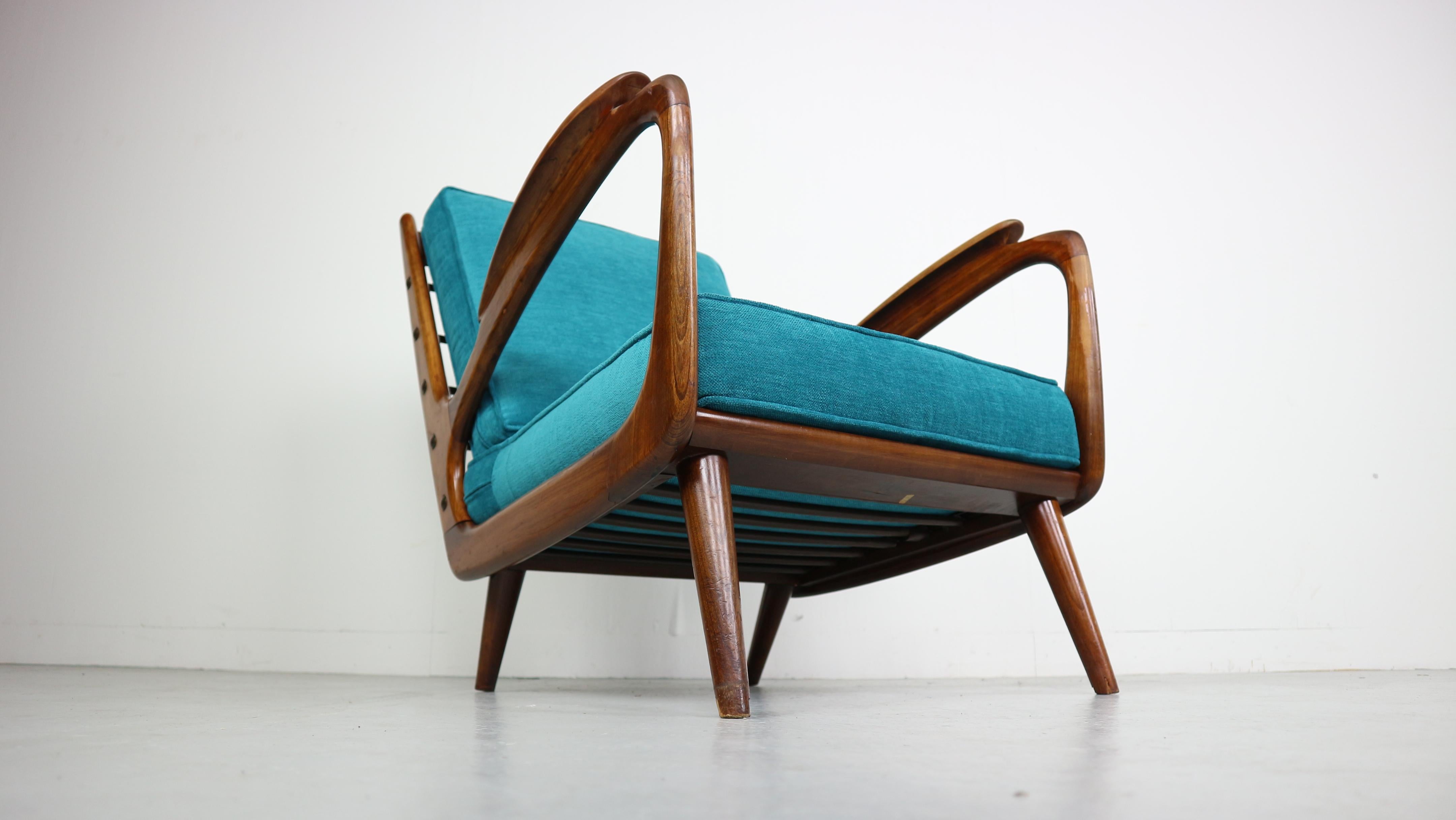 Exceptional fifties armchair from the 1950s, newly upholstered in blue.
 
