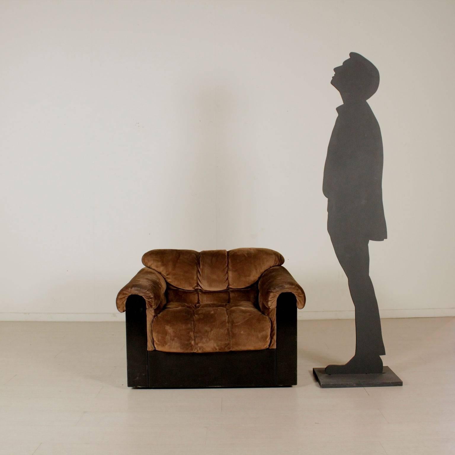 An armchair, foam padding, suede leather upholstery, lacquered wood structure. Manufactured in Italy, 1960s-1970s.