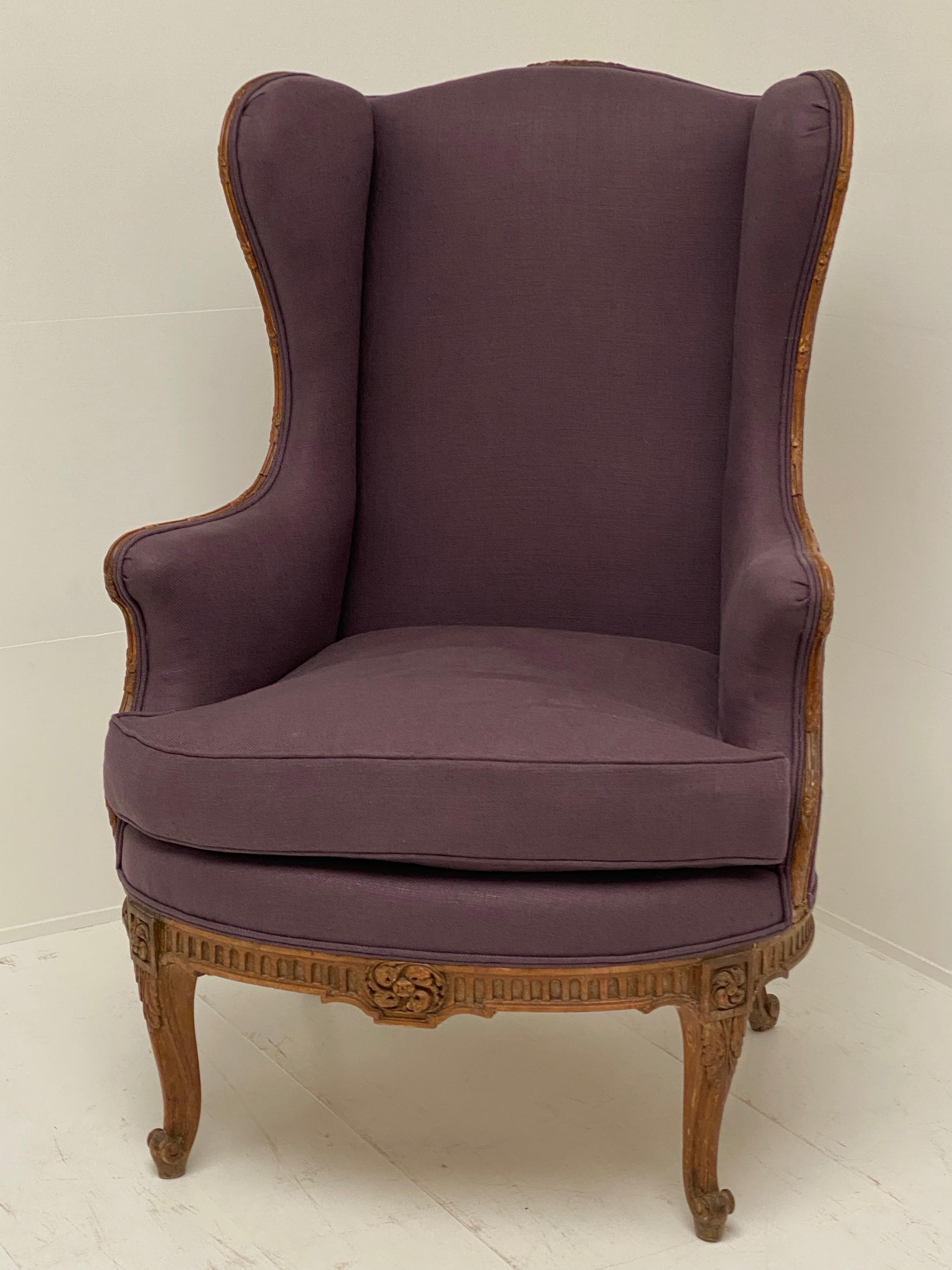 Very elegant French Armchair with nice carving and good old patina,
new Upholstery in a warm purple color.