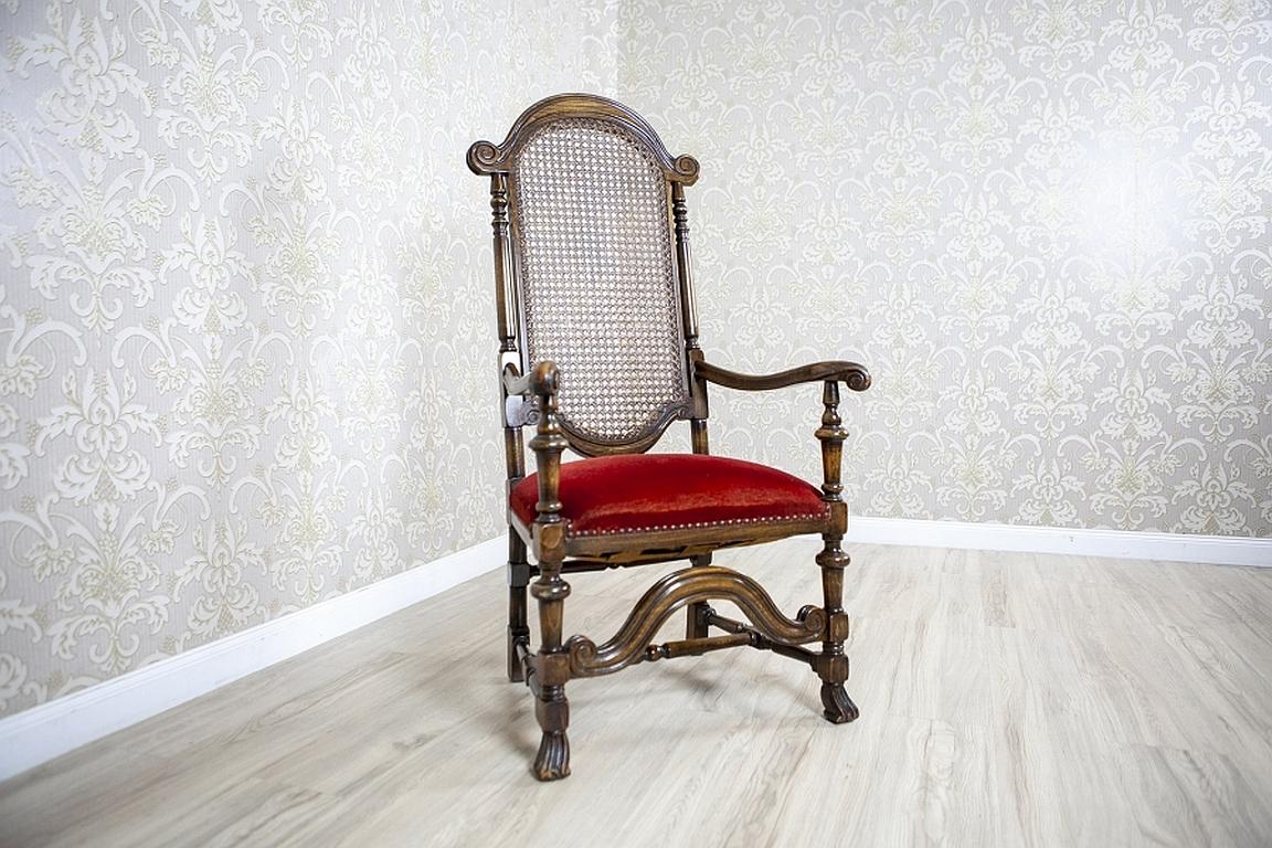 Armchair from the Early 20th Century with Rattan Backrest

We present you an armchair from the early 20th century with a rattan backrest and open armrests. The seat is upholstered with a soft fabric.

This piece of furniture has not undergone