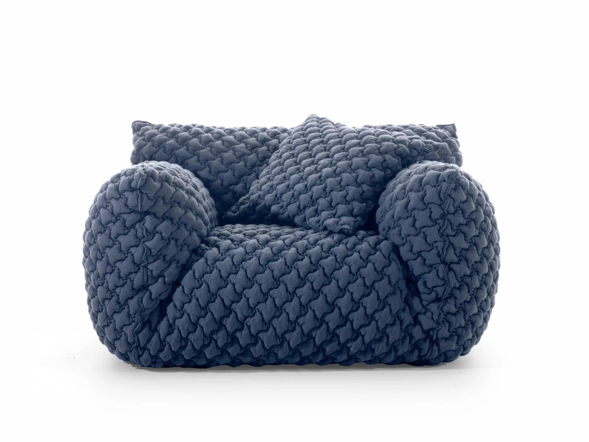 Gervasoni Nuvola 09 Armchair
Design: Paola Navone

The Nuvola collection is defined by its soft, inviting shapes that embody comfort and informality. The Nuvola 09 armchair has an aesthetic that invites you to sink in: the high armrests embrace a