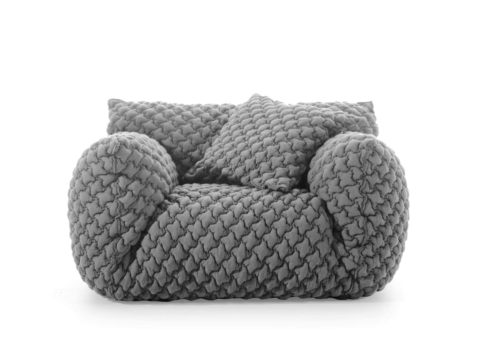 Gervasoni Nuvola 09 Armchair
Design: Paola Navone

The Nuvola collection is defined by its soft, inviting shapes that embody comfort and informality. The Nuvola 09 armchair has an aesthetic that invites you to sink in: the high armrests embrace a