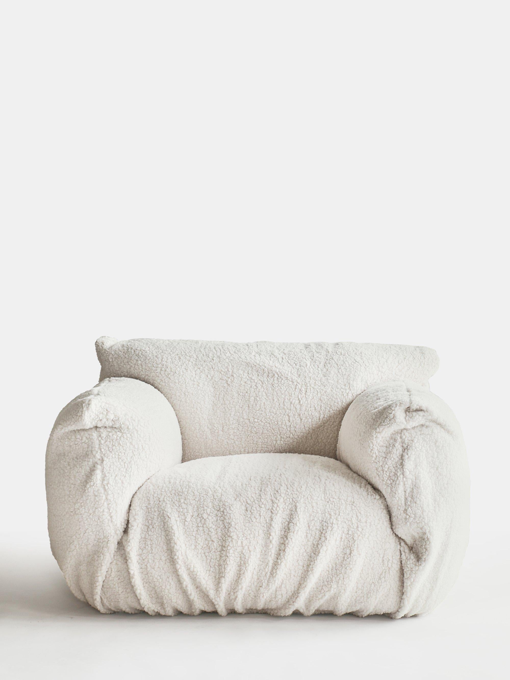 Gervasoni Nuvola 09 Armchair
Design: Paola Navone

The Nuvola collection is defined by its soft, inviting shapes that embody comfort and informality. The Nuvola 09 armchair has an aesthetic that invites you to sink in: the high armrests embrace a
