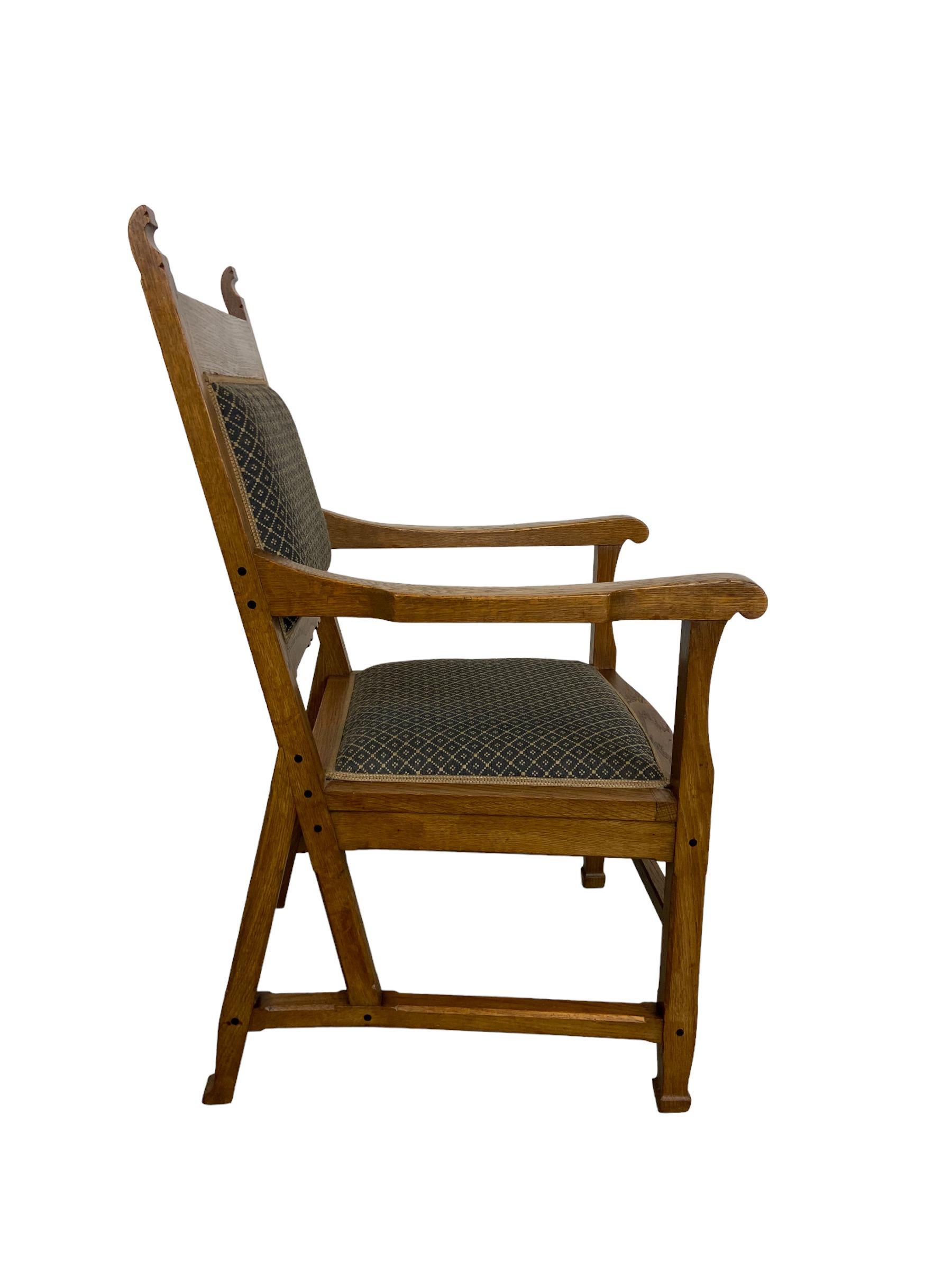 Armchair made by the company “H.F. Jansen en Zn” around 1910. This piece of dutch design is made of oak wood and the upholstery is in a good condition. Branded ”H.F. Jansen en zn Amsterdam” on the bottom of the chair. H.F. Jansen made among other