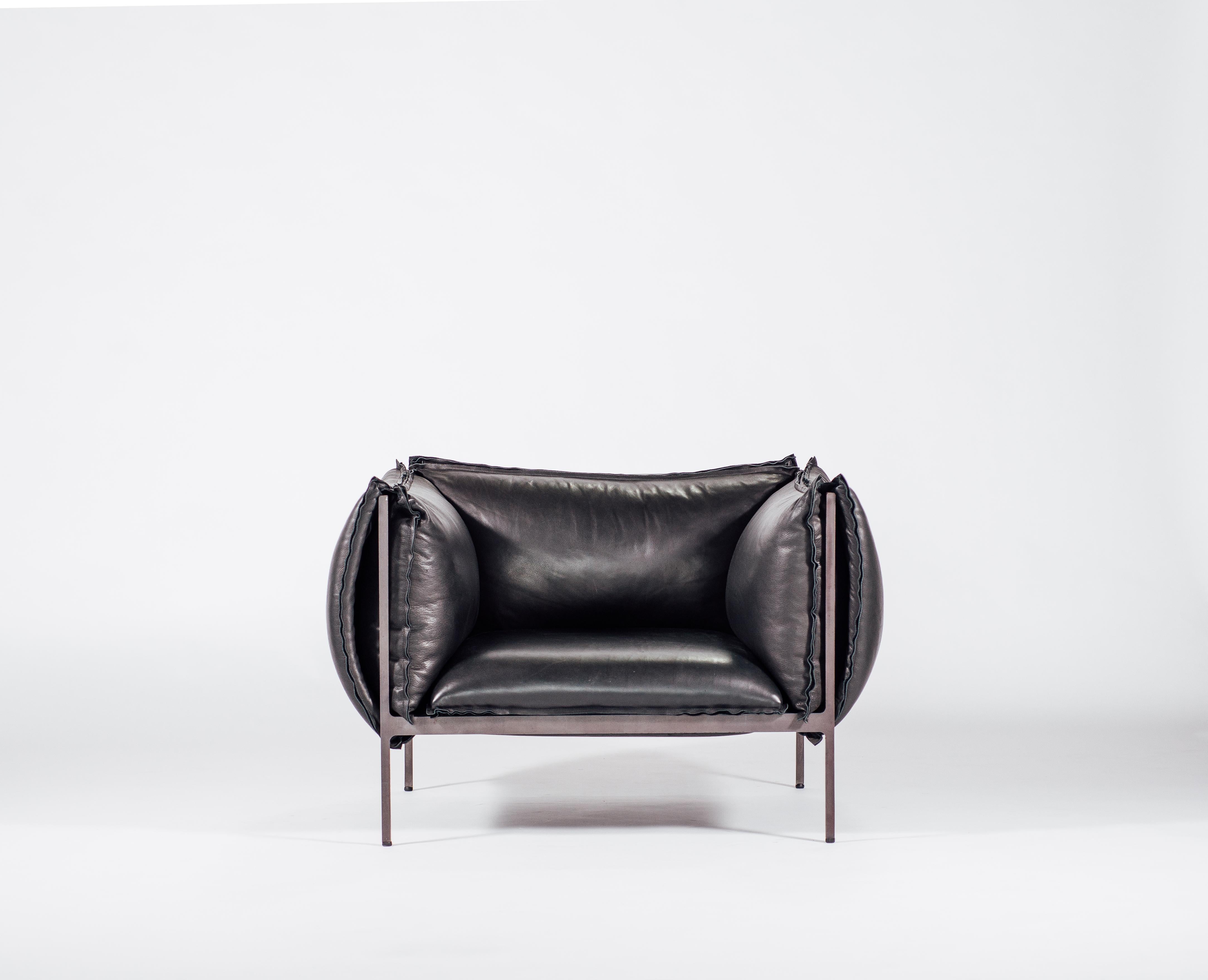 Modern Armchair in Smooth Black Leather and Laser-Cut Steel For Sale