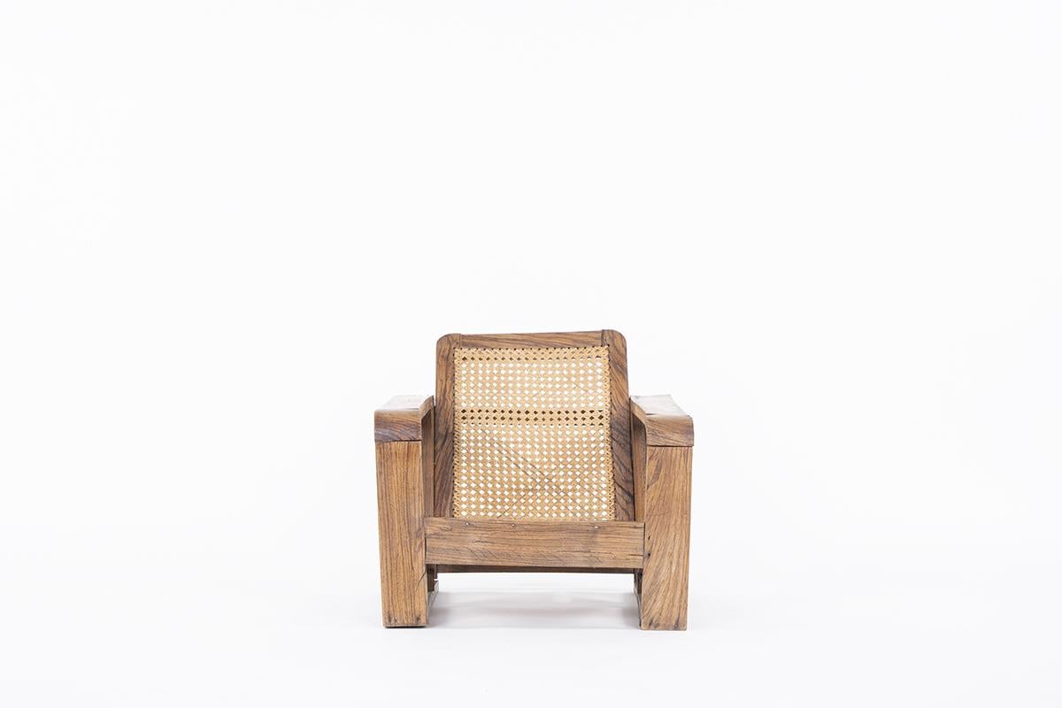 Armchair from the 50s in France.
Structure with armrests in zebrano wood, seat and back in cane.
Imperfections on the wood structure, product on its juice.
 