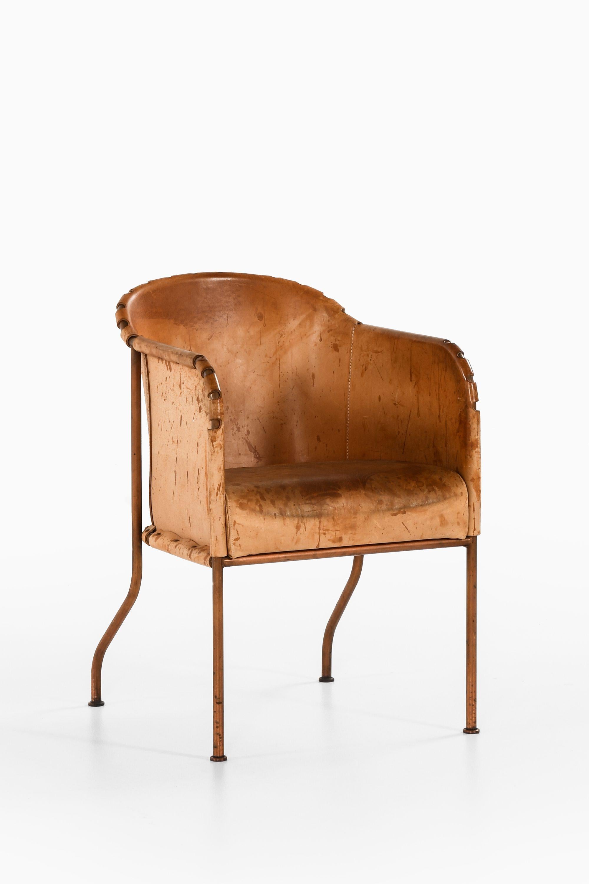 Poltrona in rame e pelle di Mats Theselius

Informazioni aggiuntive:
Materiale: Rame, pelle
Stile: Contemporaneo, scandinavo
Poltrona modello Ambassad disegnata da Mats Theselius
Prodotto da Källemo a Värnamo, in Svezia.
Dimensioni (L. x P. x H.):
