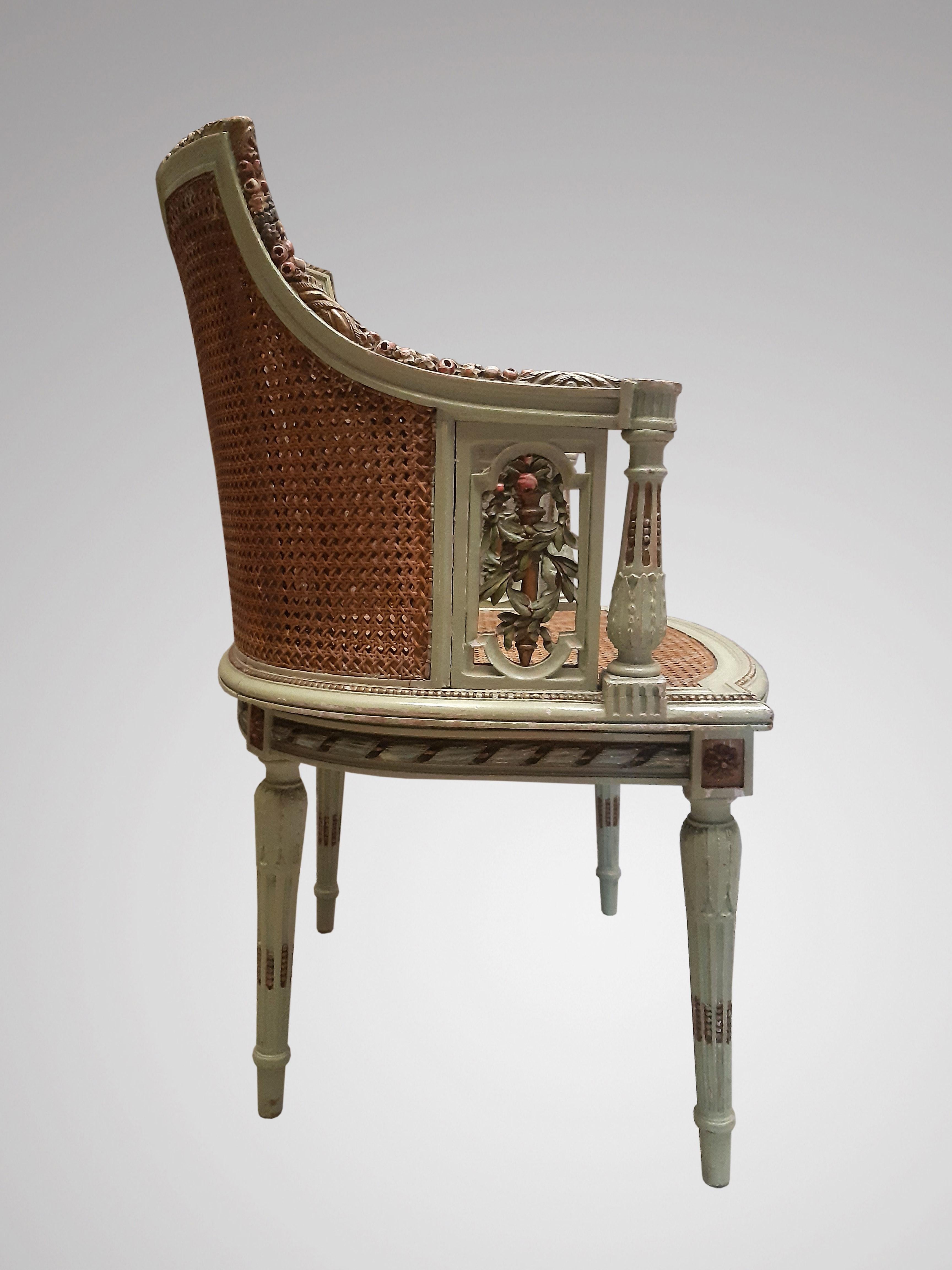 Pretty Louis XVI style armchair, with hollow armrest. Carved and patinated flowers. Caning in braces. No restoration, in good condition. French antiquity