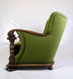 Armchair in Green Fabric with Wood Carvings from 1920s.