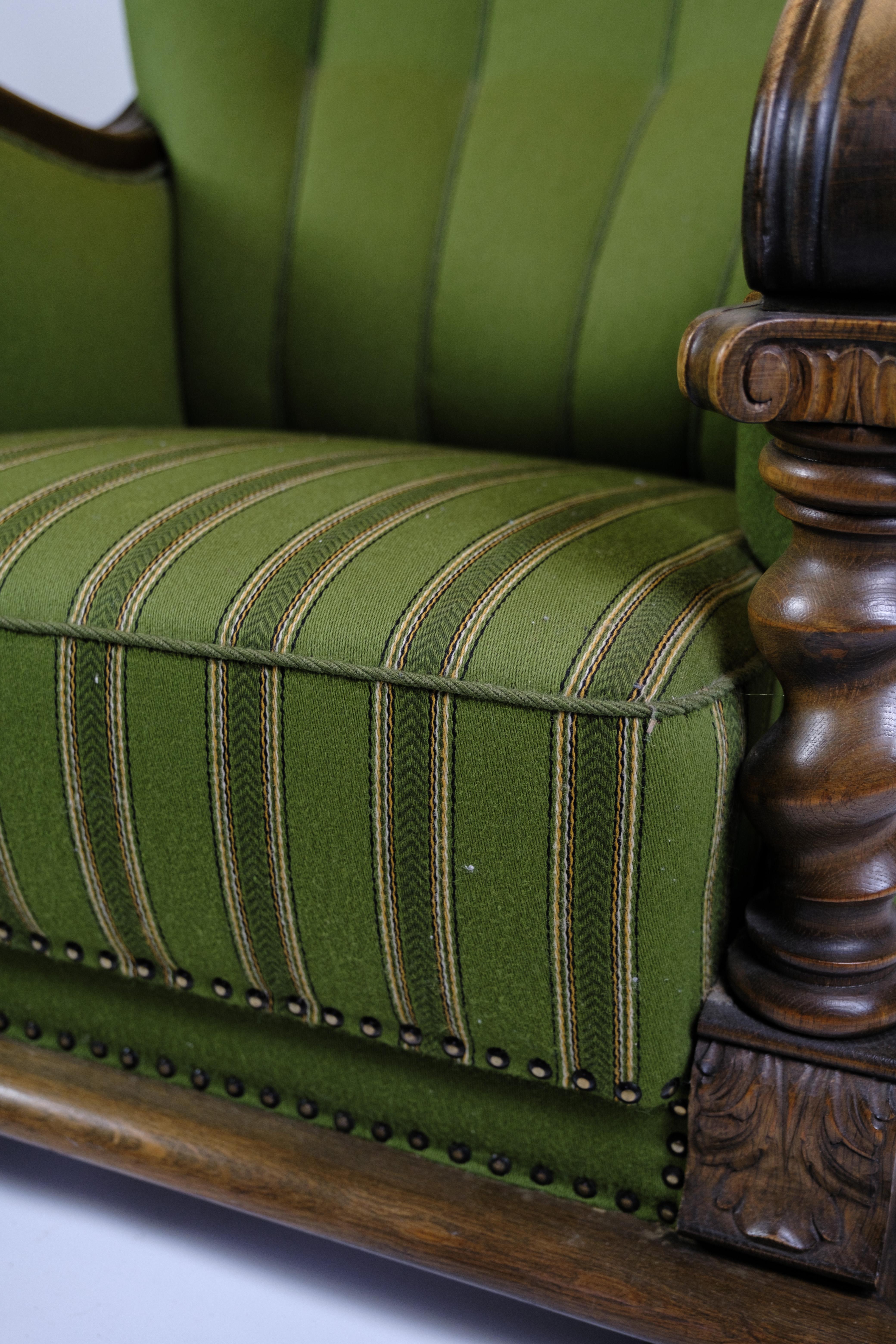 Armchair in Green Fabric with Wood Carvings from 1920s. In Good Condition For Sale In Lejre, DK