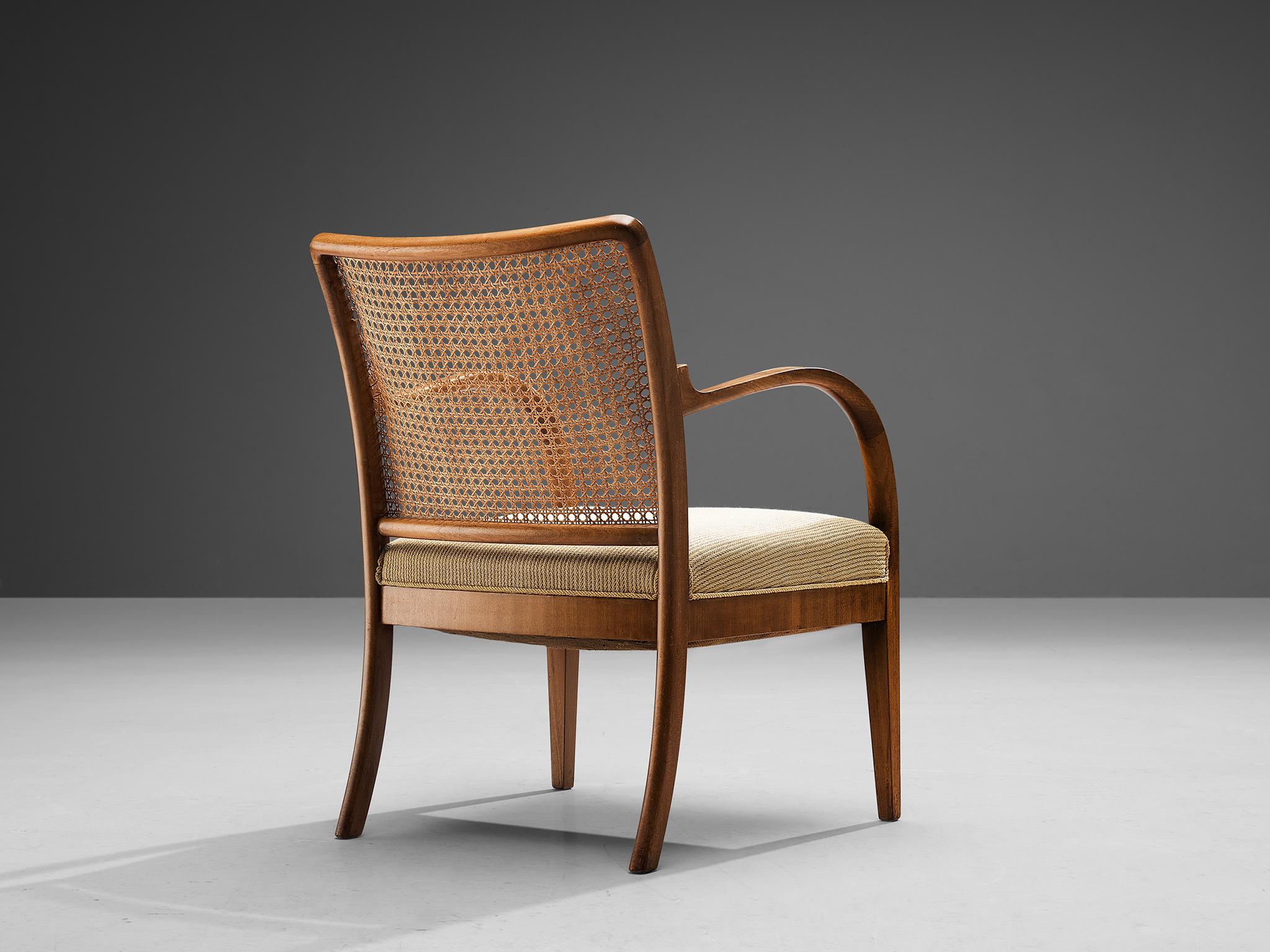 European Armchair in Mahogany and Cane