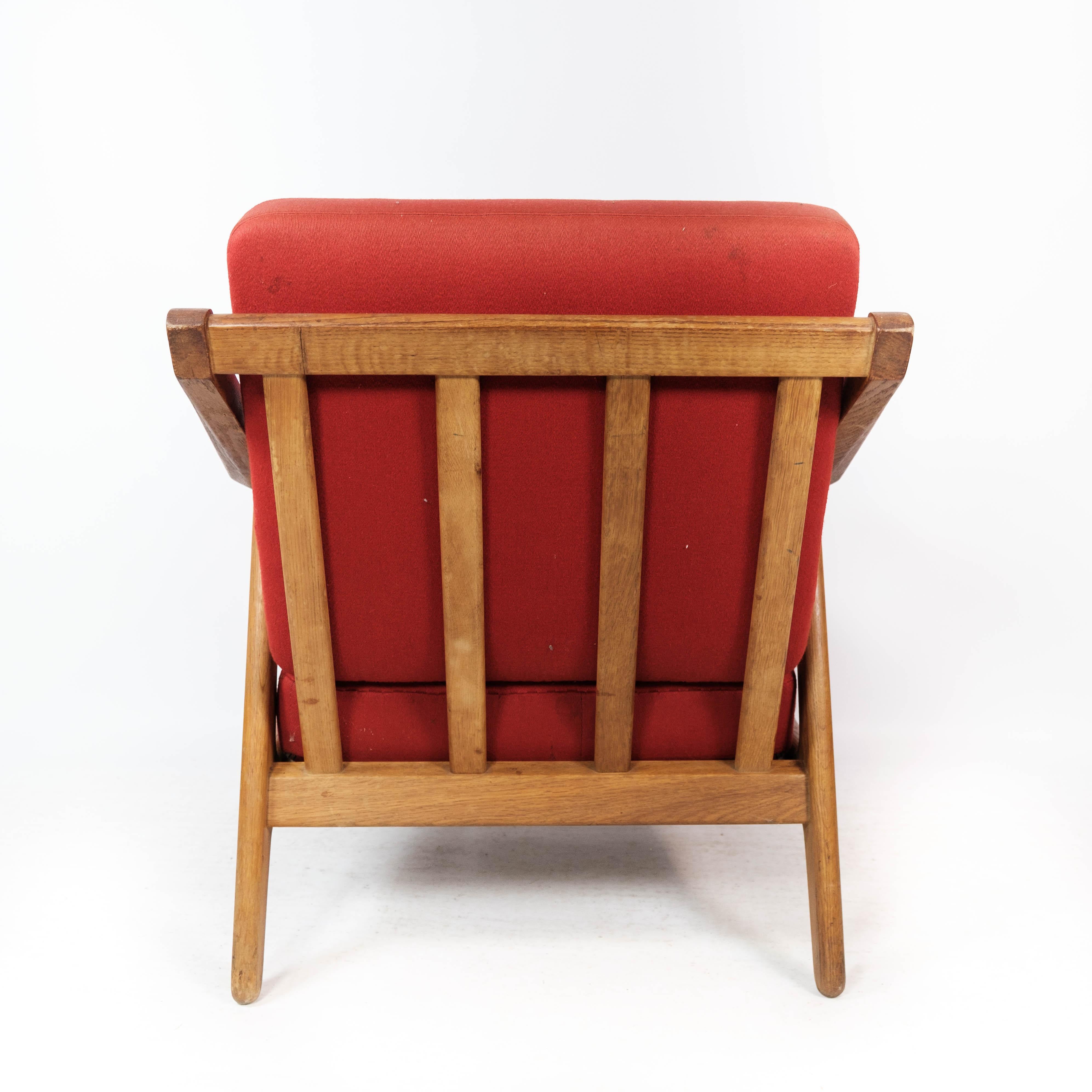 Mid-20th Century Armchair in Oak and Upholstered with Red Fabric, by H. Brockmann Petersen, 1960s For Sale