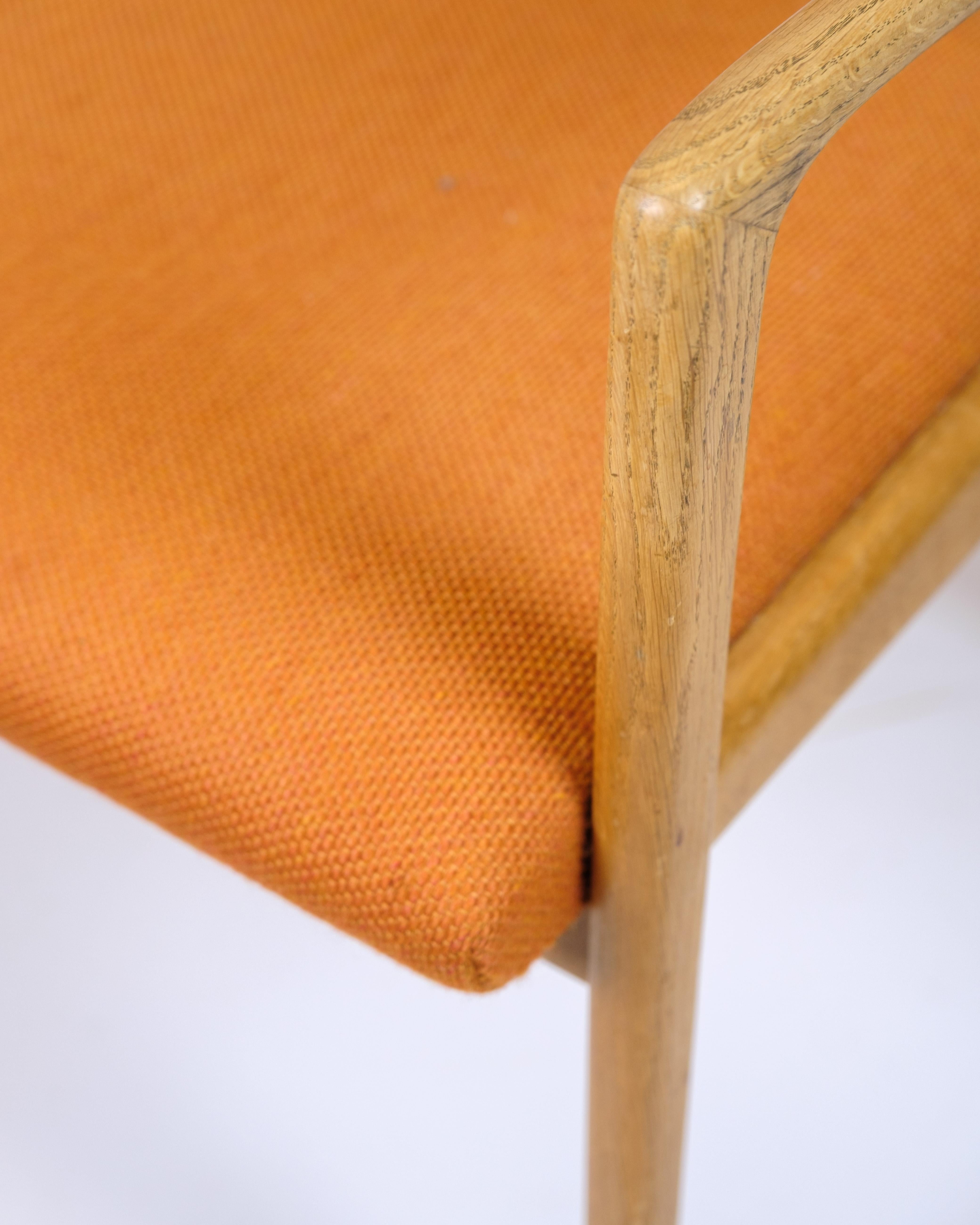 Svedese Poltrona in Oak e tessuto arancione di Karl-Erik Ekselius per JOC Vetlanda in vendita