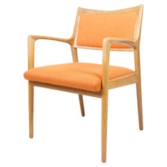 Poltrona in Oak e tessuto arancione di Karl-Erik Ekselius per JOC Vetlanda