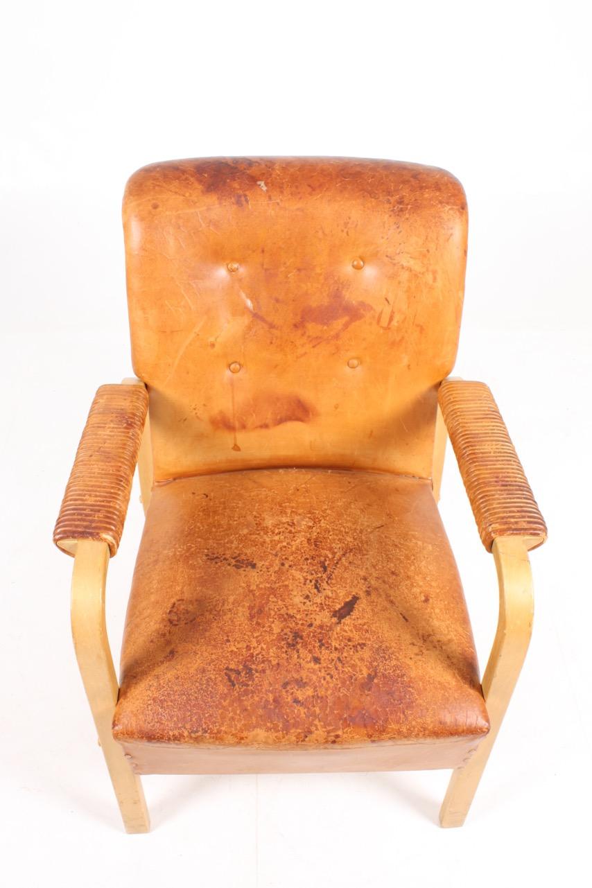 Finnish Armchair in Patinated Leather by Alvar Aalto, 1950s