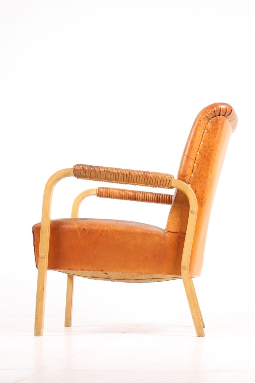 Mid-20th Century Armchair in Patinated Leather by Alvar Aalto, 1950s