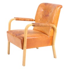 Armchair in Patinated Leather by Alvar Aalto, 1950s Armchair in Patinated Leather by Alvar Aalto, 1950s