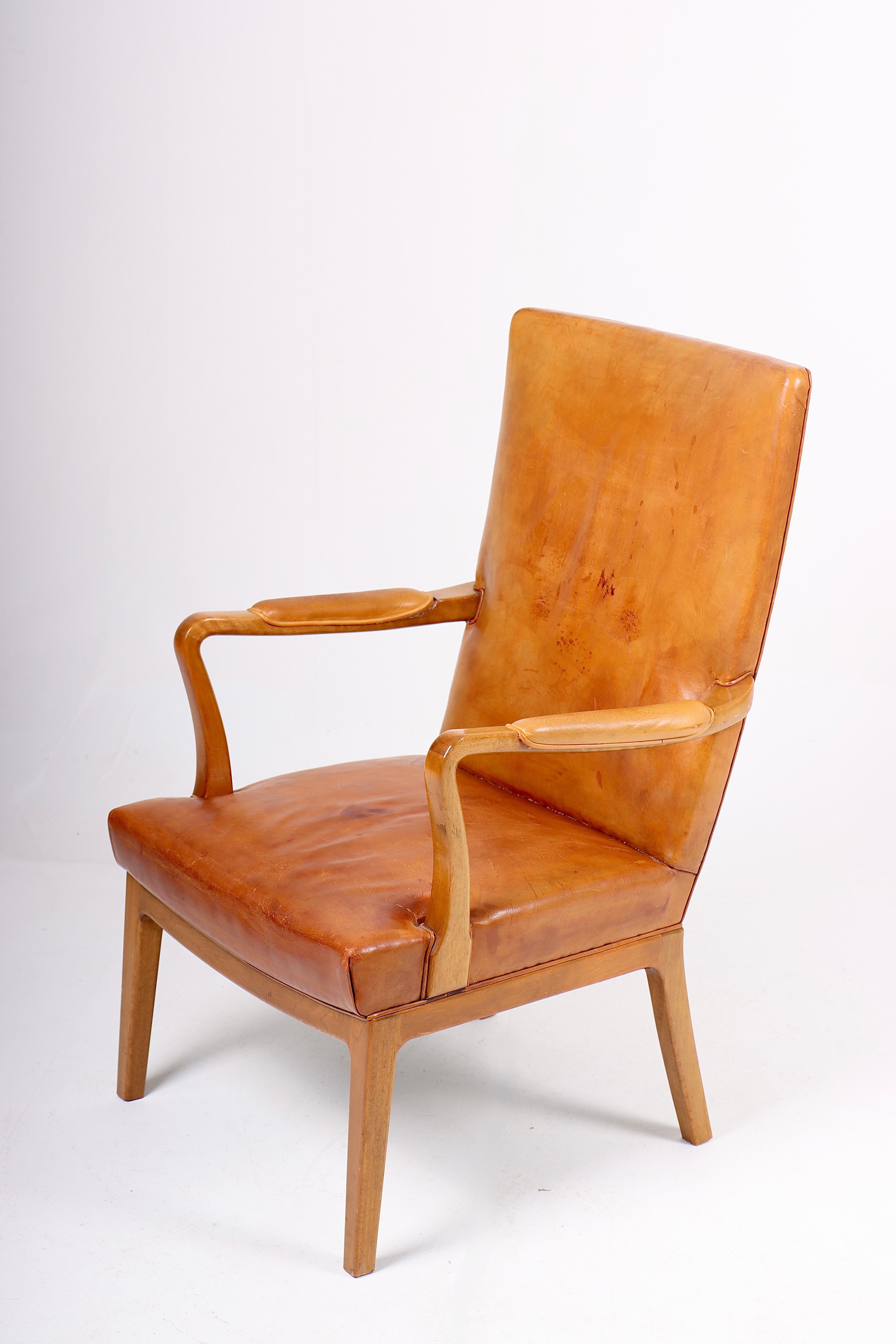 Scandinavian Modern Armchair in Patinated Leather by Lysberg Hansen & Terp, 1940s
