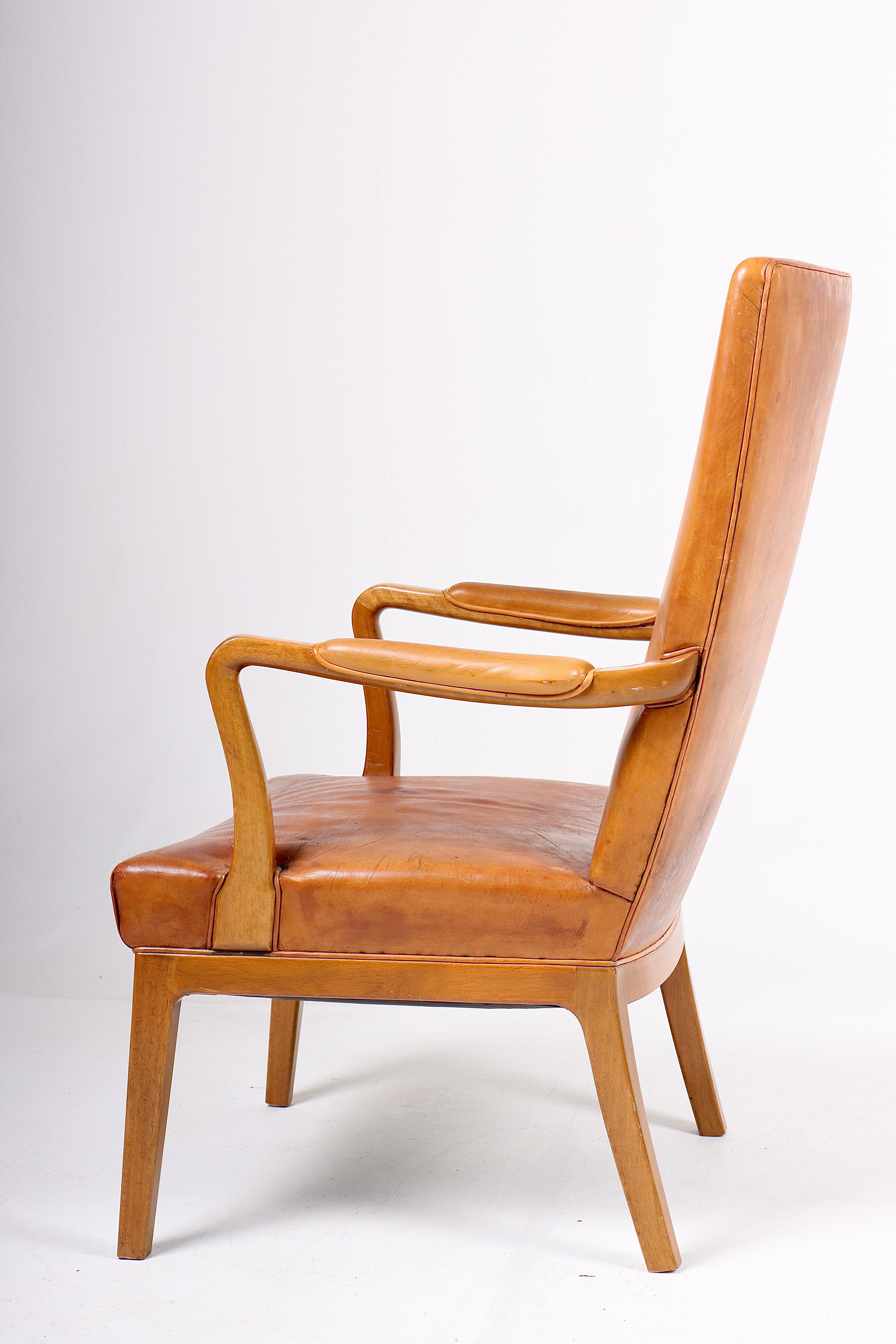 Danish Armchair in Patinated Leather by Lysberg Hansen & Terp, 1940s