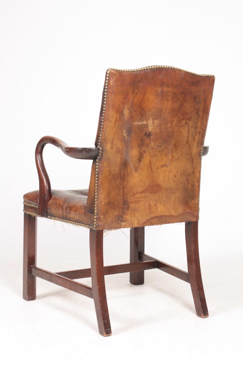Mid-20th Century Armchair in Patinated Leather, Danish Design, 1940s For Sale