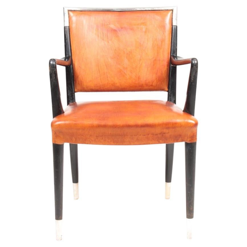 Armchair in patinated leather, made by Lysberg Hansen & Terp in 1940s. Made in Denmark. Great condition.