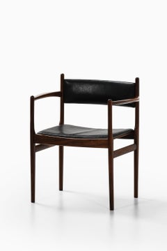 Armchair in Rosewood and Black Leather by Kai Lyngfeldt Larsen, 1960's