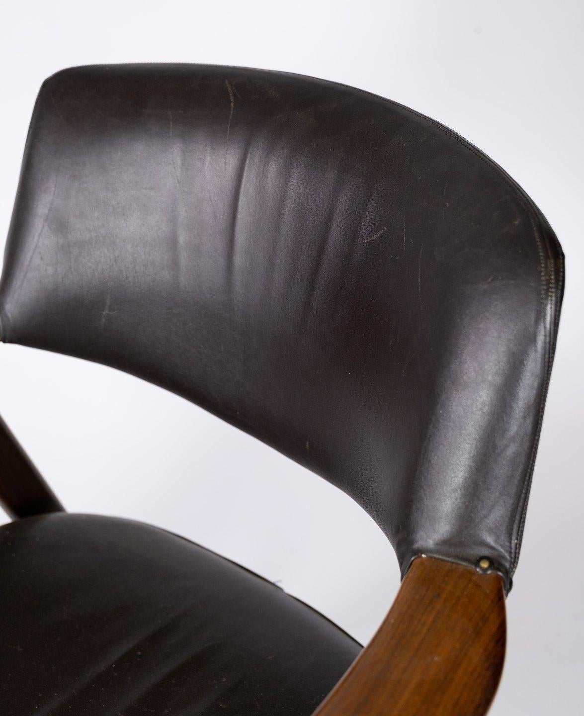 Scandinavian Modern Armchair in Rosewood and Black Leather of Danish Design from 1976