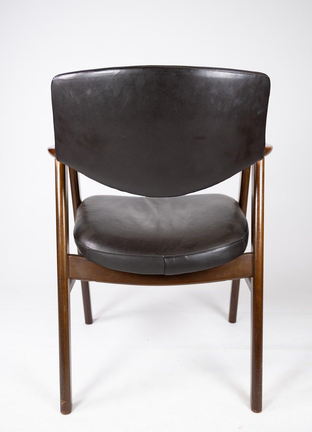 Late 20th Century Armchair in Rosewood and Black Leather of Danish Design from 1976