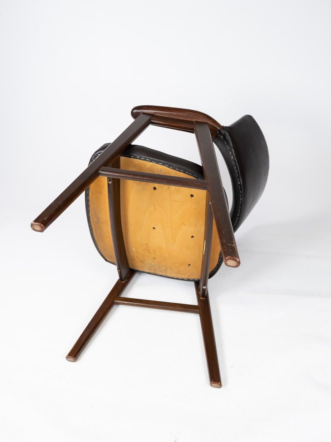 Armchair in Rosewood and Black Leather of Danish Design from 1976 1
