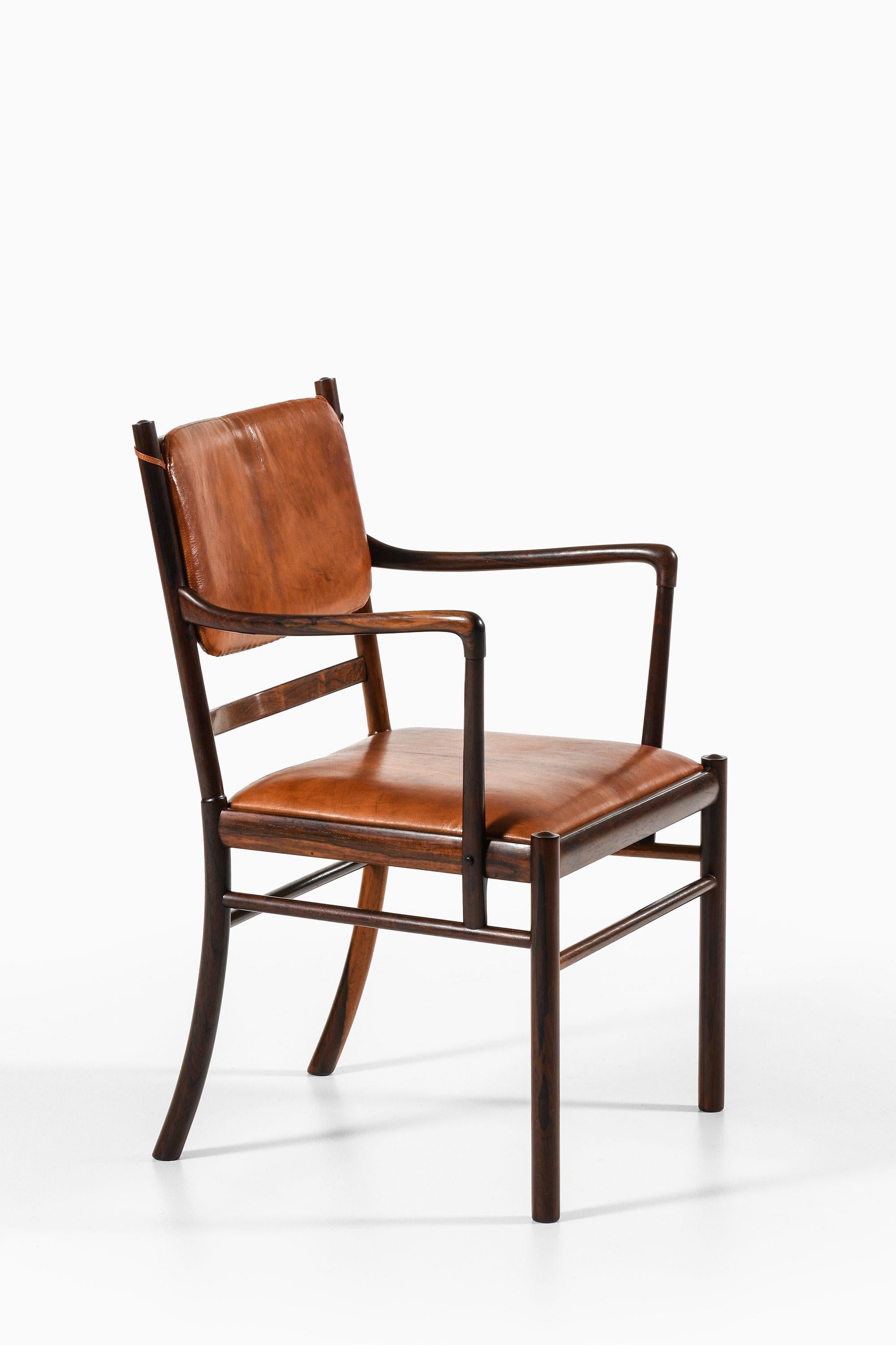 Armchair in Rosewood and Upholstered in Patinated Niger Leather by Ole Wanscher, 1960's

Additional Information:
Material: Rosewood and upholstered in patinated Niger leather
Style: Mid century, Scandinavia
Rare armchair model PJ 311 /