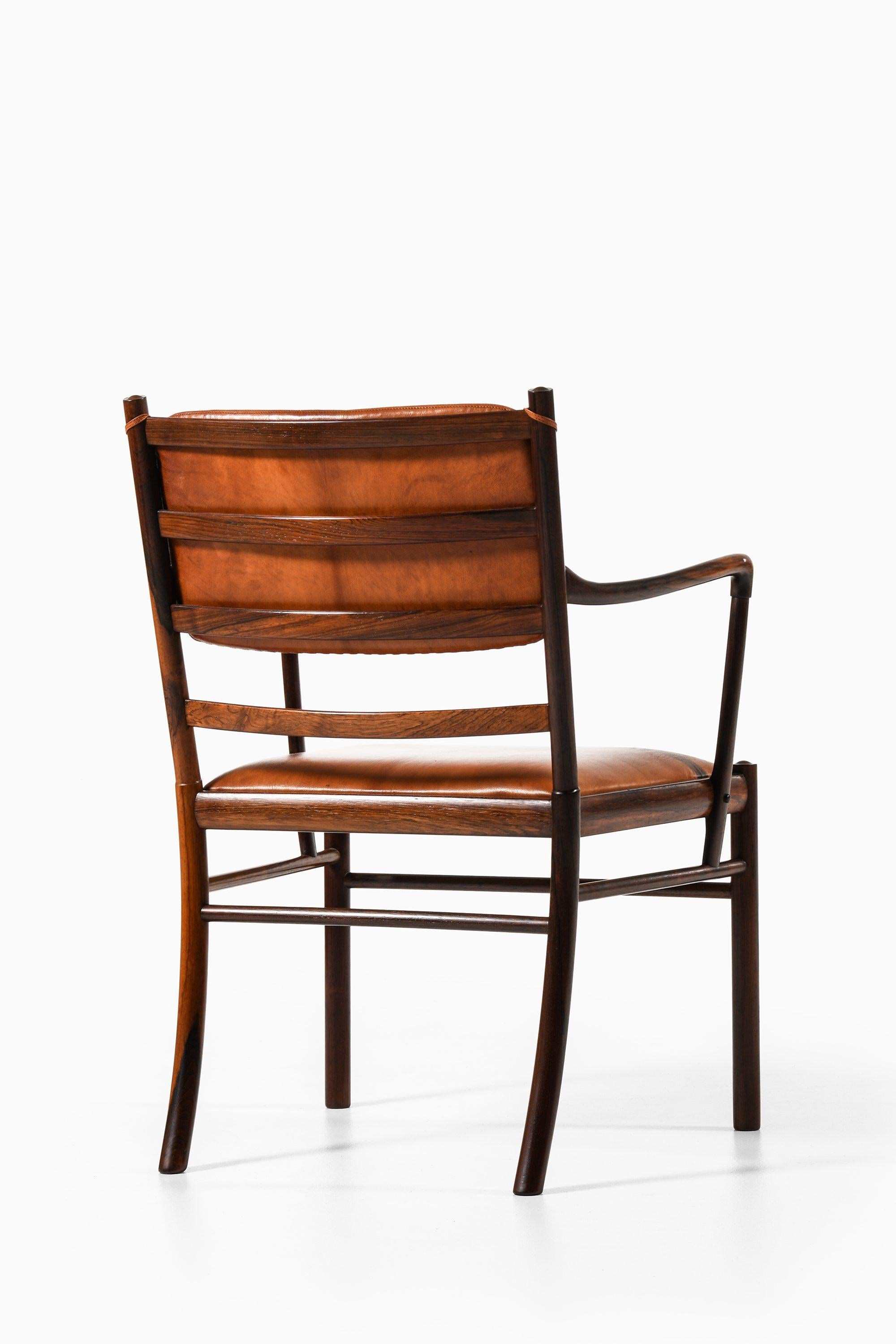 Scandinavian Modern Armchair in Rosewood and Upholstered in Niger Leather by Ole Wanscher, 1960's For Sale