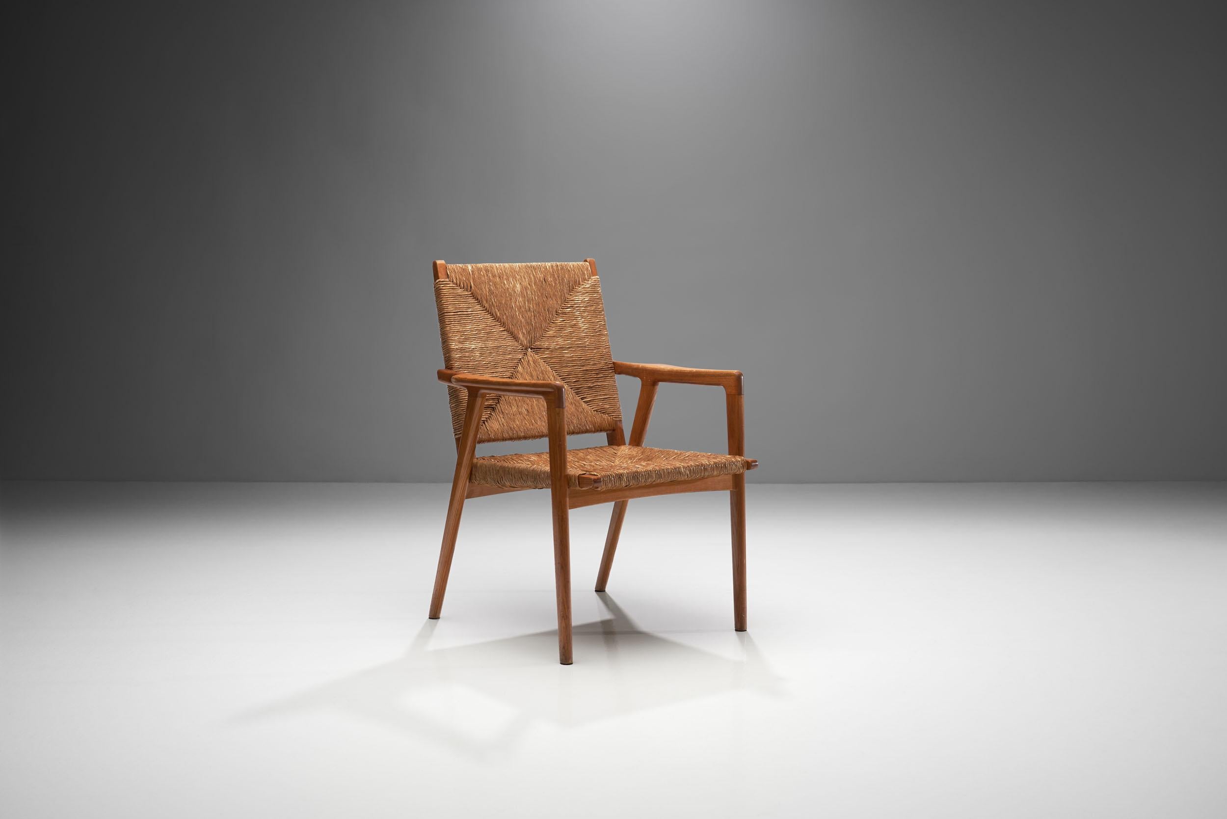 The partnership of two natural materials. The caned seat and backrest of the chair are supported by the solid oak frame. The material is often referred to as ‘cord’, which was often used in Danish furniture of the 1940s-1960s. Danish cord is a