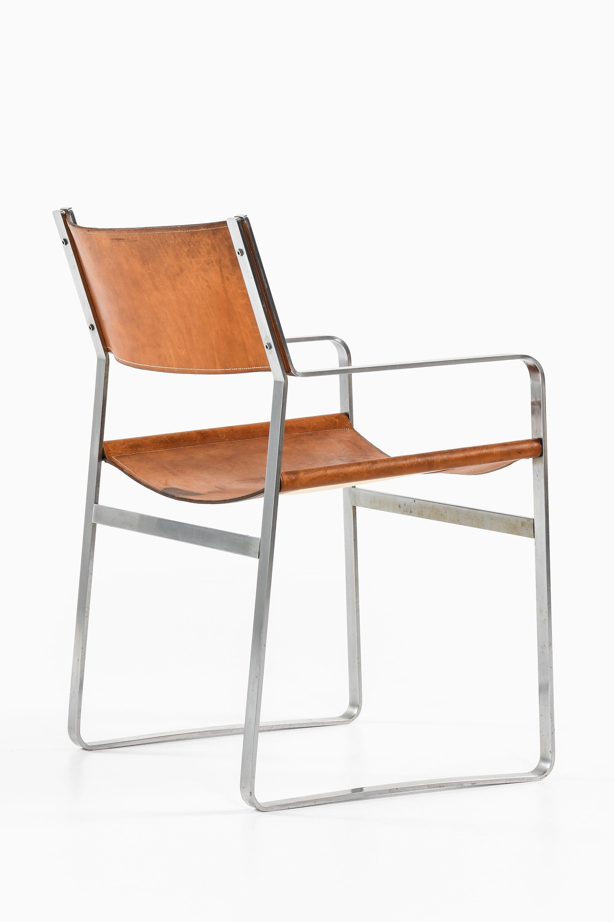 Danish Armchair in Steel and Original Leather by Hans Wegner, 1970s For Sale