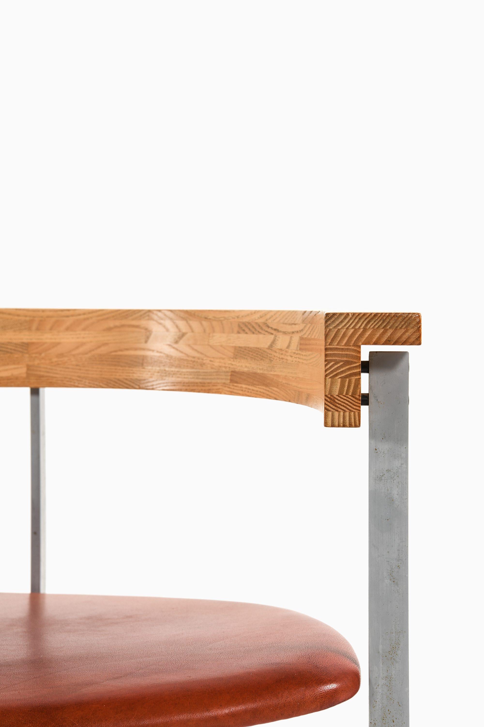 Sillón de acero, fresno y cuero original de Poul Kjærholm, años 50 siglo XX en venta