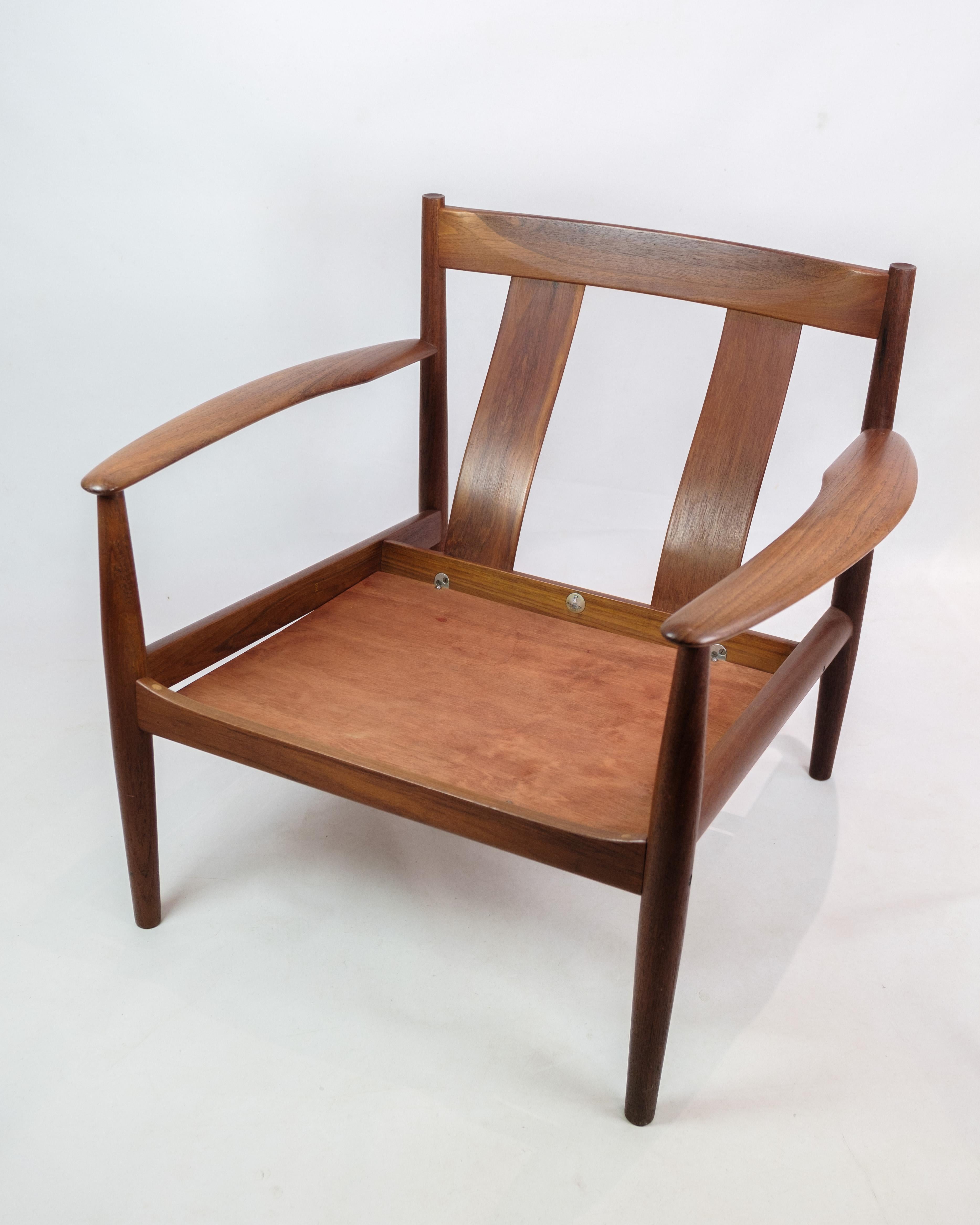 Danish Armchair In Teak and black leather, Model 118 Designed By Grete Jalk From 1960s For Sale