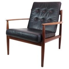 Vintage Armchair In Teak and black leather, Model 118 Designed By Grete Jalk From 1960s