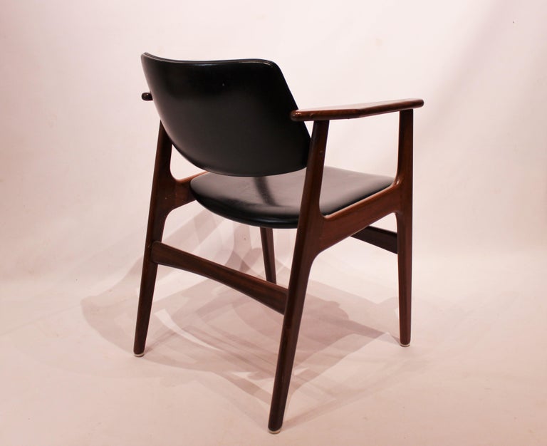 Scandinavian Modern Armchair in Teak and Black Leather of Danish Design from the 1960s