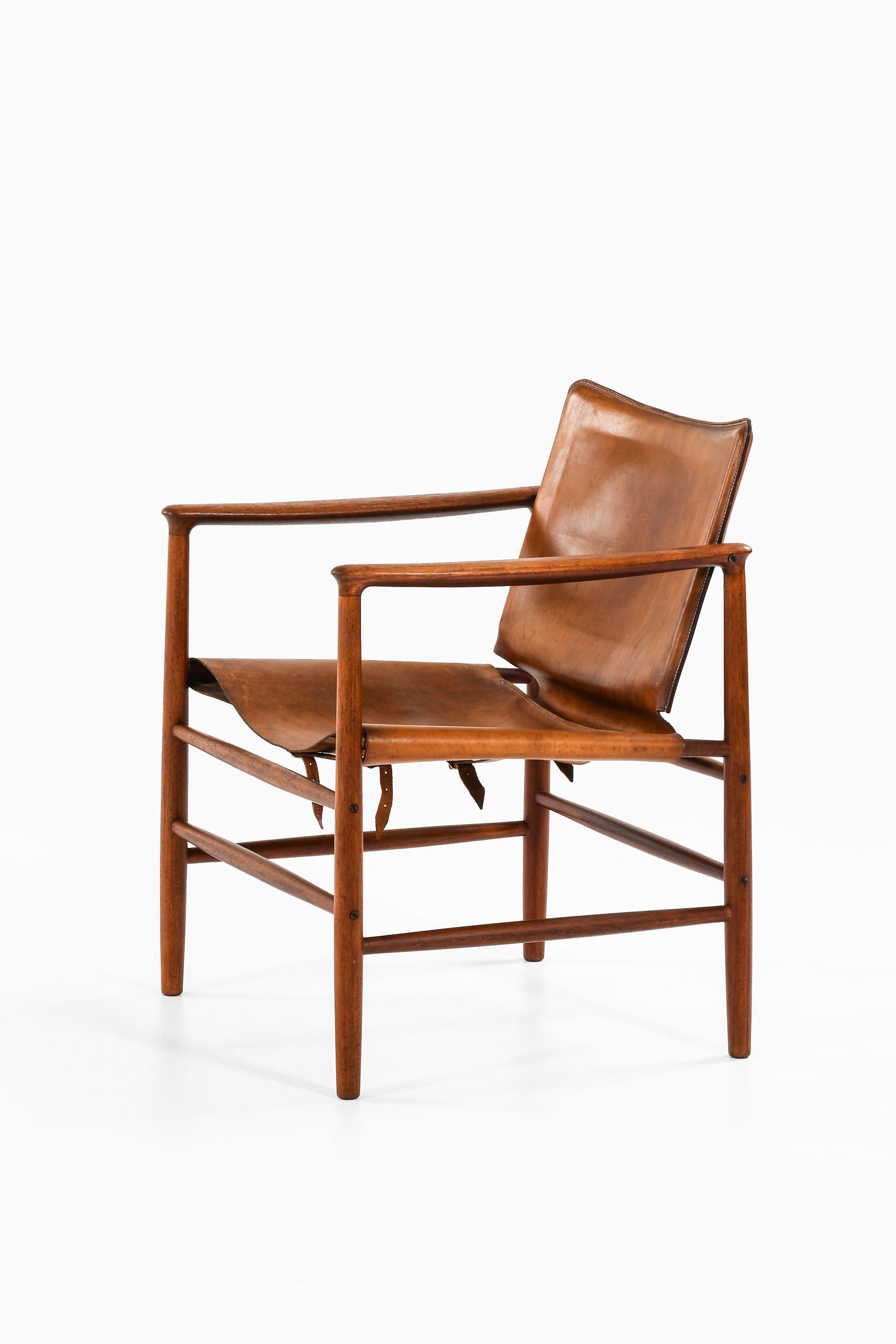 Scandinavian Modern Armchair in Teak and Leather by Kai Lyngfeldt Larsen, 1957 For Sale