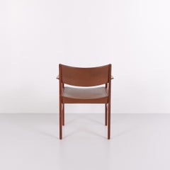 Poltrona in teak e pelle marrone, design danese degli anni '60