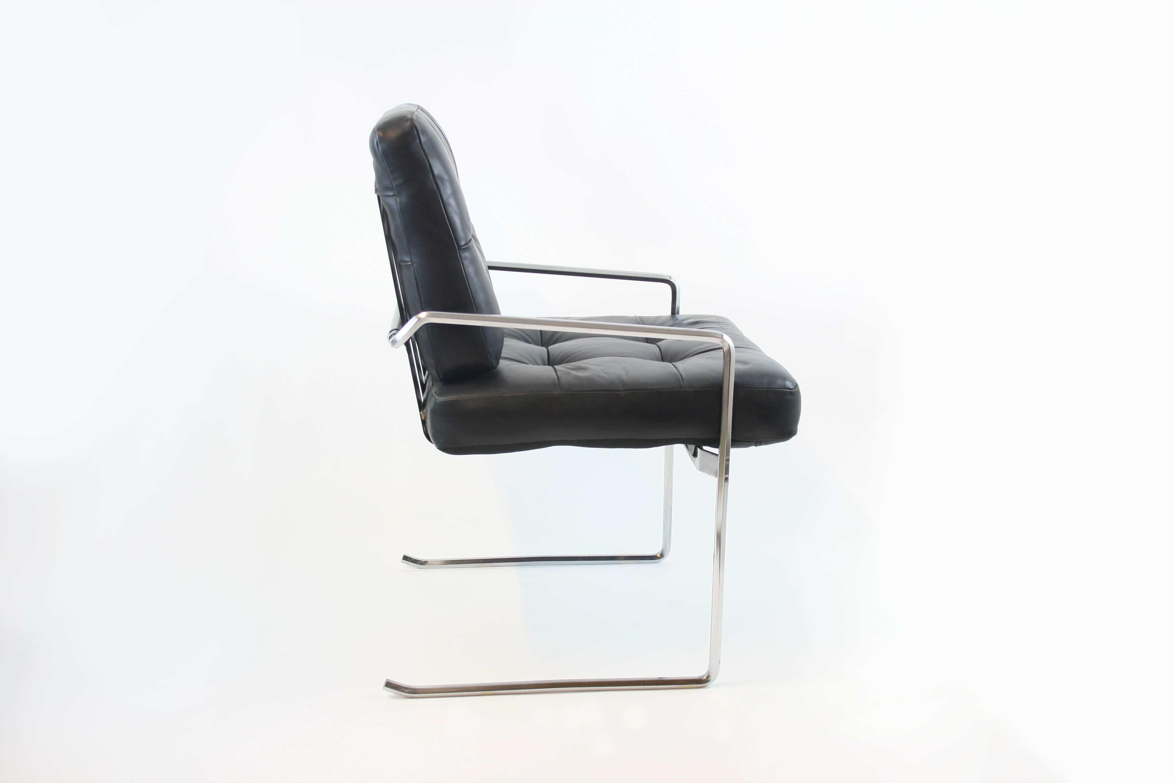 Mid-Century Modern Armchair cantilever in the manner of Pierre Paulin, leather, black, steelframe For Sale