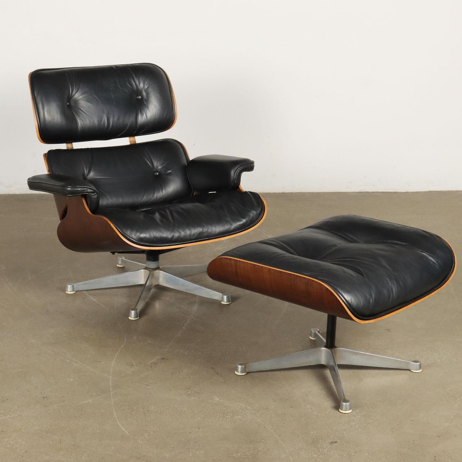 Swivel armchair with pouf; aluminum base, curved wood shell veneered with exotic wood, foam padding, leather upholstery. Good condition.