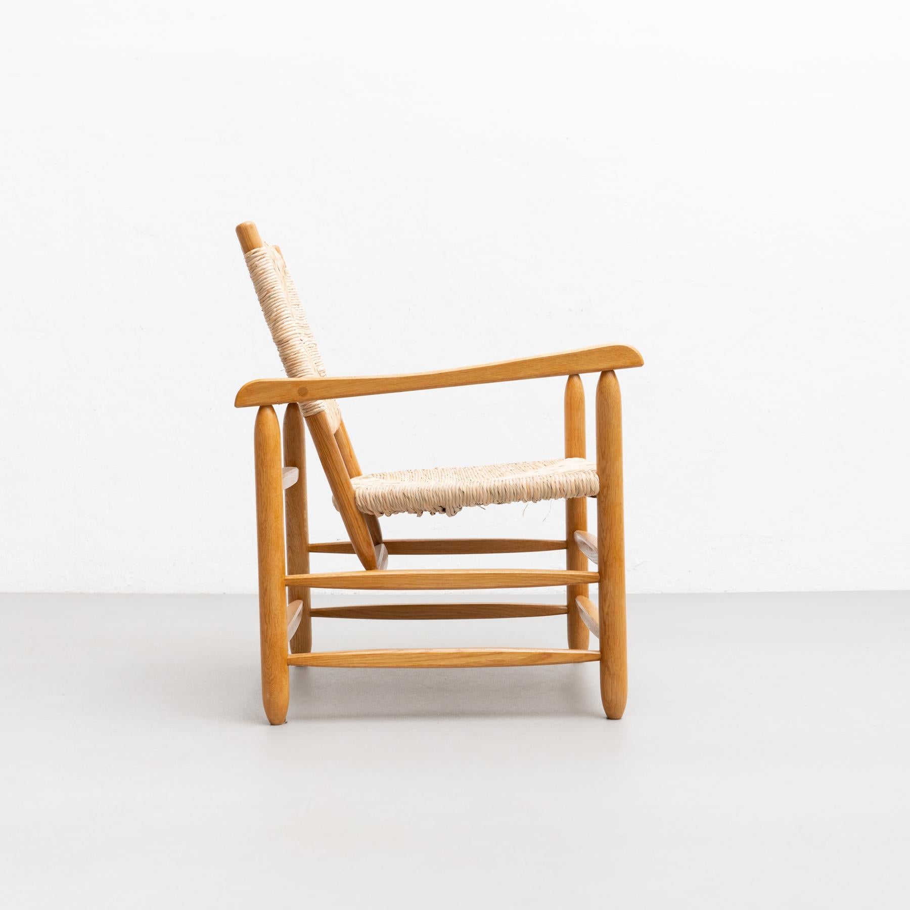 Armchair in Wood and Cane, circa 1980 For Sale 4