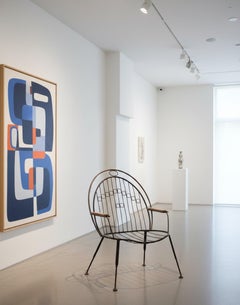 Armchair in wood , iron and bronze, France, 1950