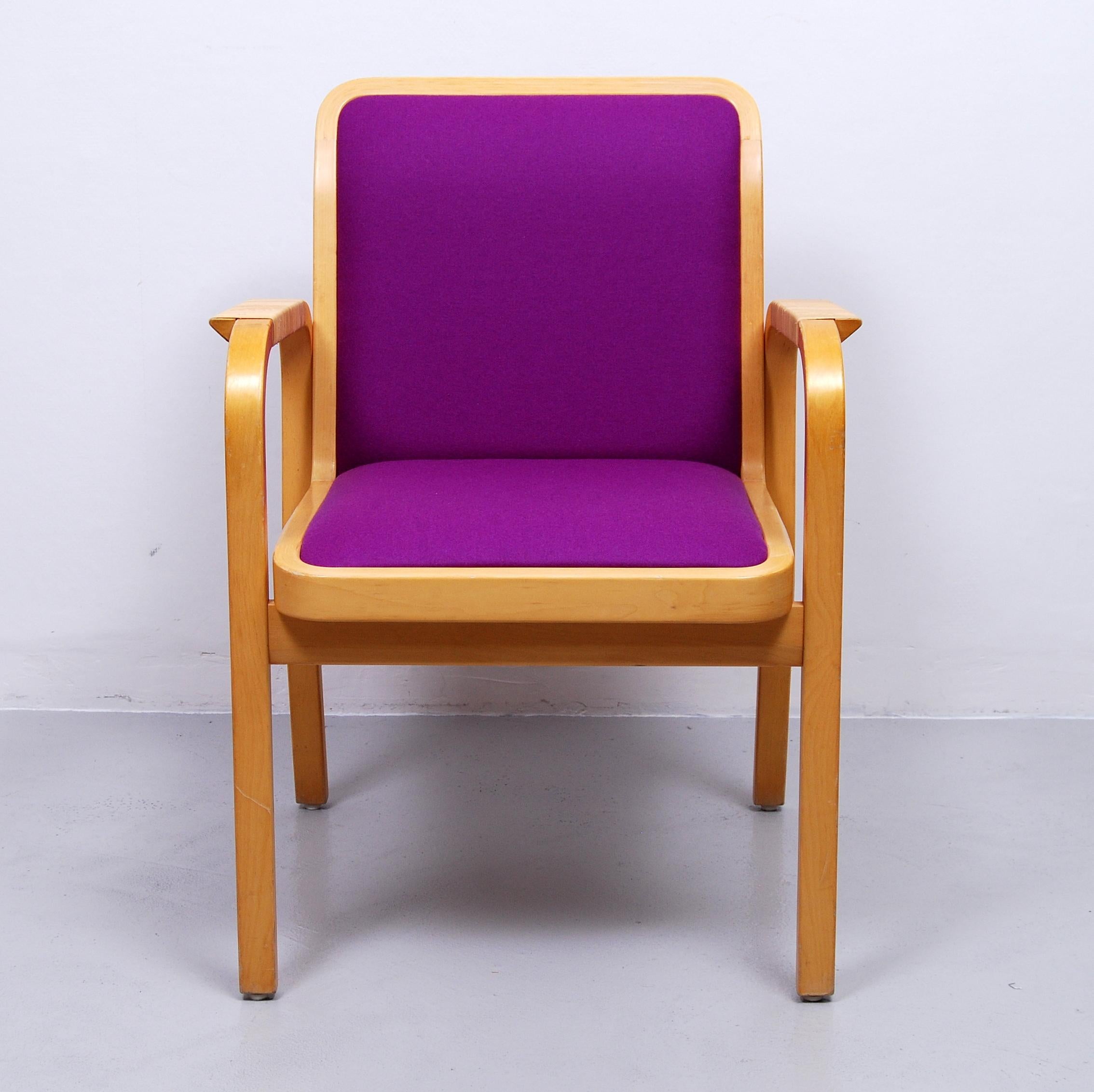Armchair model 45 designed by Alvar Aalto in 1947 and made by Artek. This chair has been reupholstered with new mauve fabric, armrests are tightly wound in rattan.