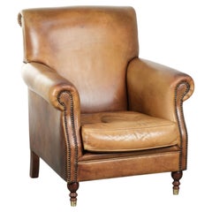 Armchair made of cowhide leather with a characterful English look