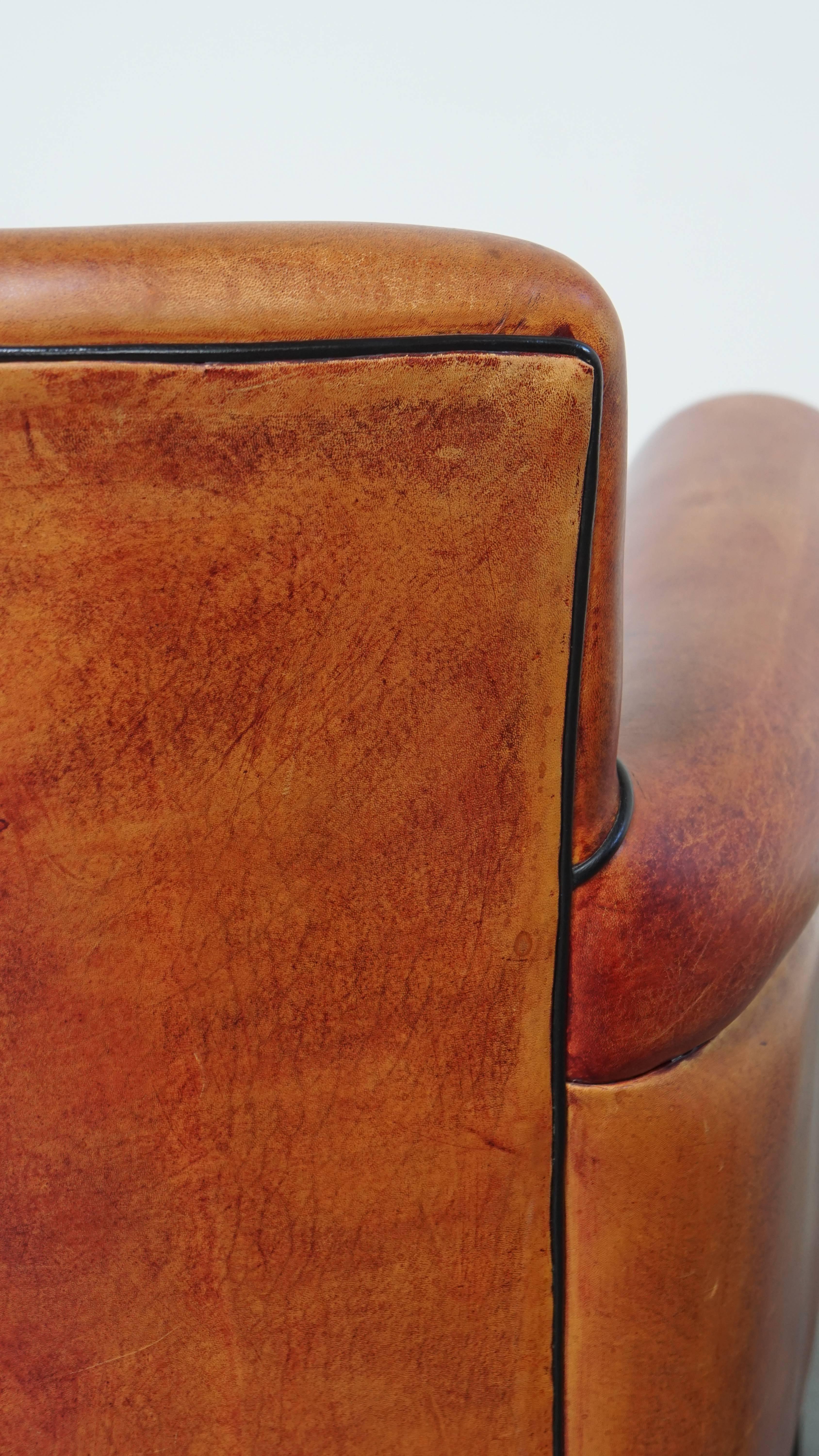 Sillón de piel de oveja en un exclusivo color rojo/marrón en venta 7