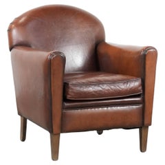 Sessel aus Schafsleder im Art-Deco-Design mit warmen Farben