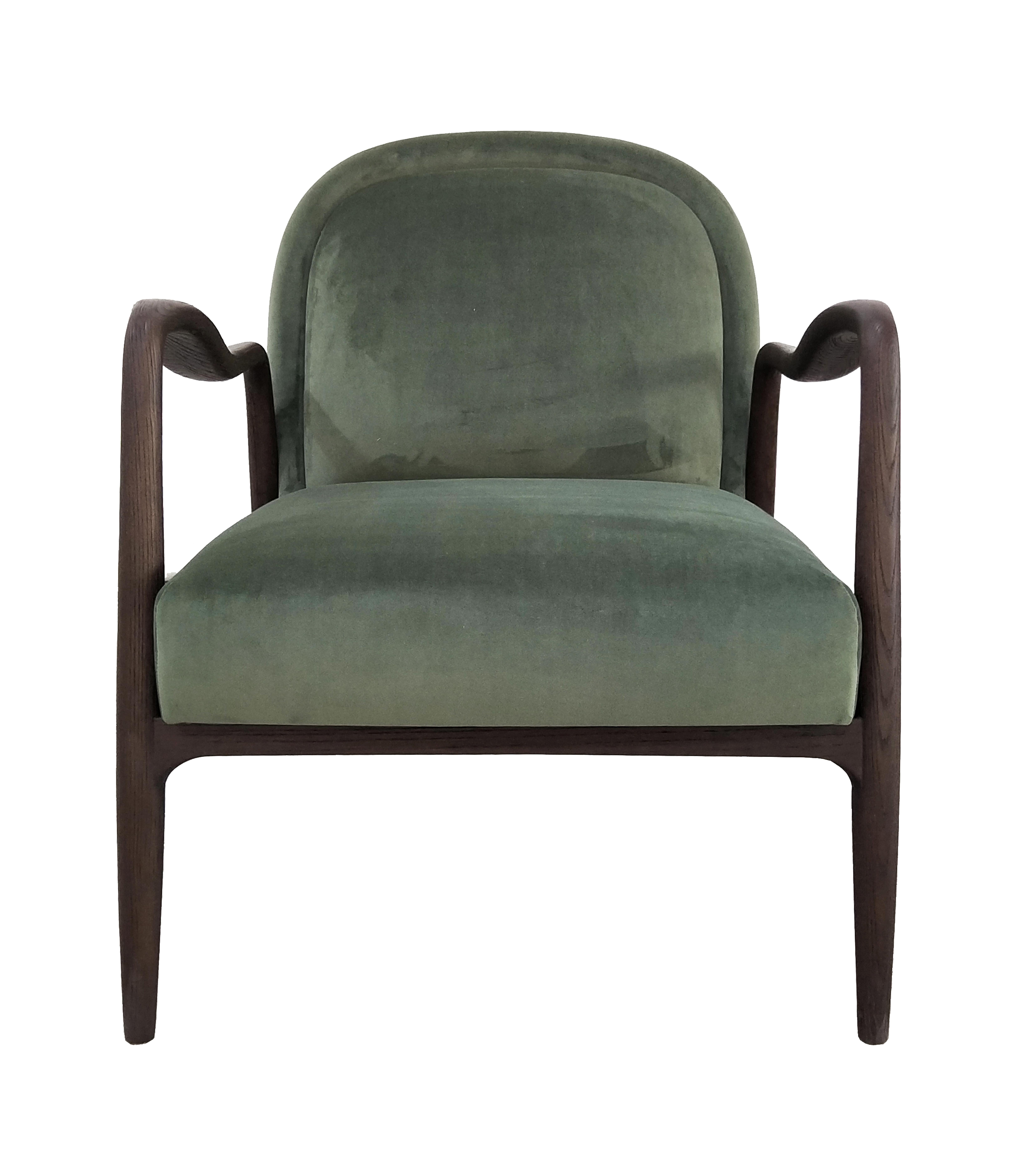 Upholstered armchair.
Velvet like touch olive green color fabric.
Solid oak and handmade.

Description: Armchair
Color: Brown and Olive Green
Size: 72 x 82 x 78H cm
Material: Oak and Fabric
Collection: Mid Century Rhythm
