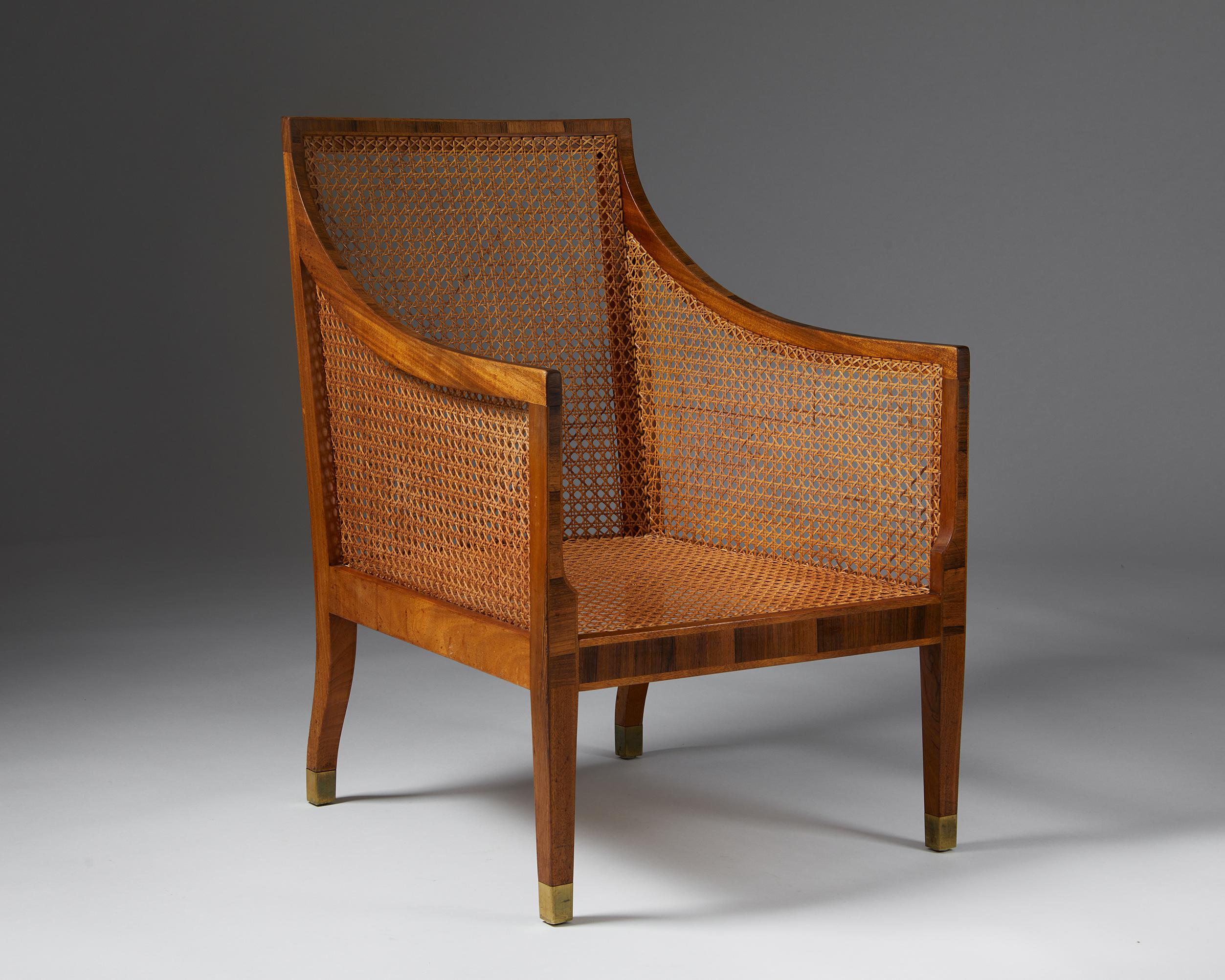 Armchair model 4488 designed by Kaare Klint for Rud. Rasmussen,
Denmark, 1931.
Mahogany with Brazilian rosewood inlays and woven cane.


Exquisite woodwork and canework make this piece by the Danish master Kaare Klint an exceptional example of